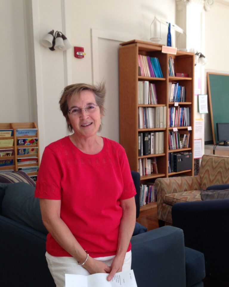 linda in room with books in background