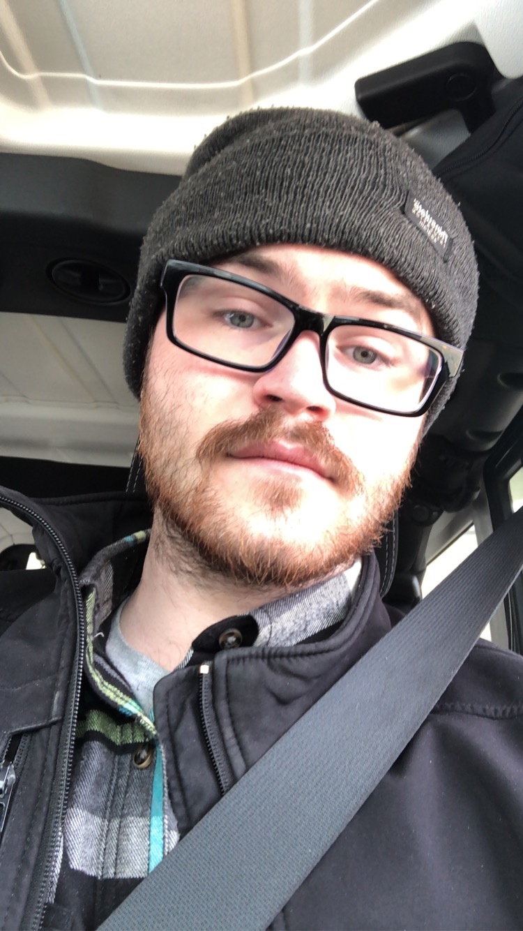 headshot of mason gurtler wearing a winter hat