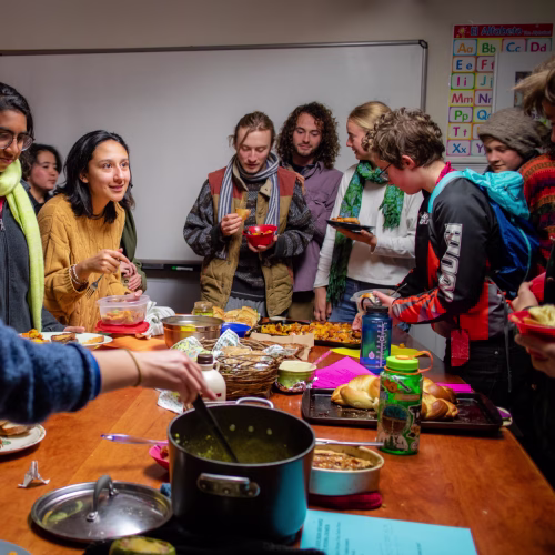 Group enjoying diverse food together.