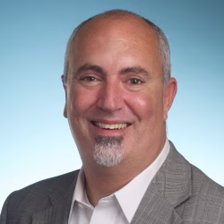Professional portrait with gray suit.