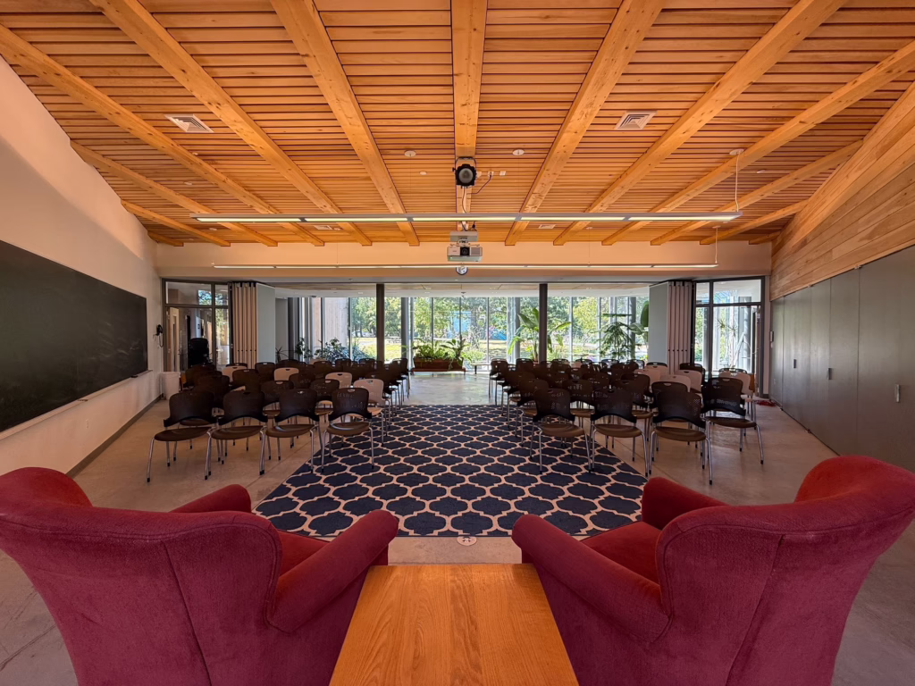 Spacious room with chairs and windows