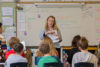 Teacher instructing students in classroom